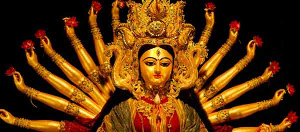 Goddess Durga Sparkles In Gold In Kolkata Pujas